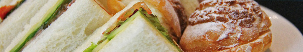 Eating Breakfast & Brunch Sandwich at Beans & Brews Coffeehouse restaurant in Pocatello, ID.